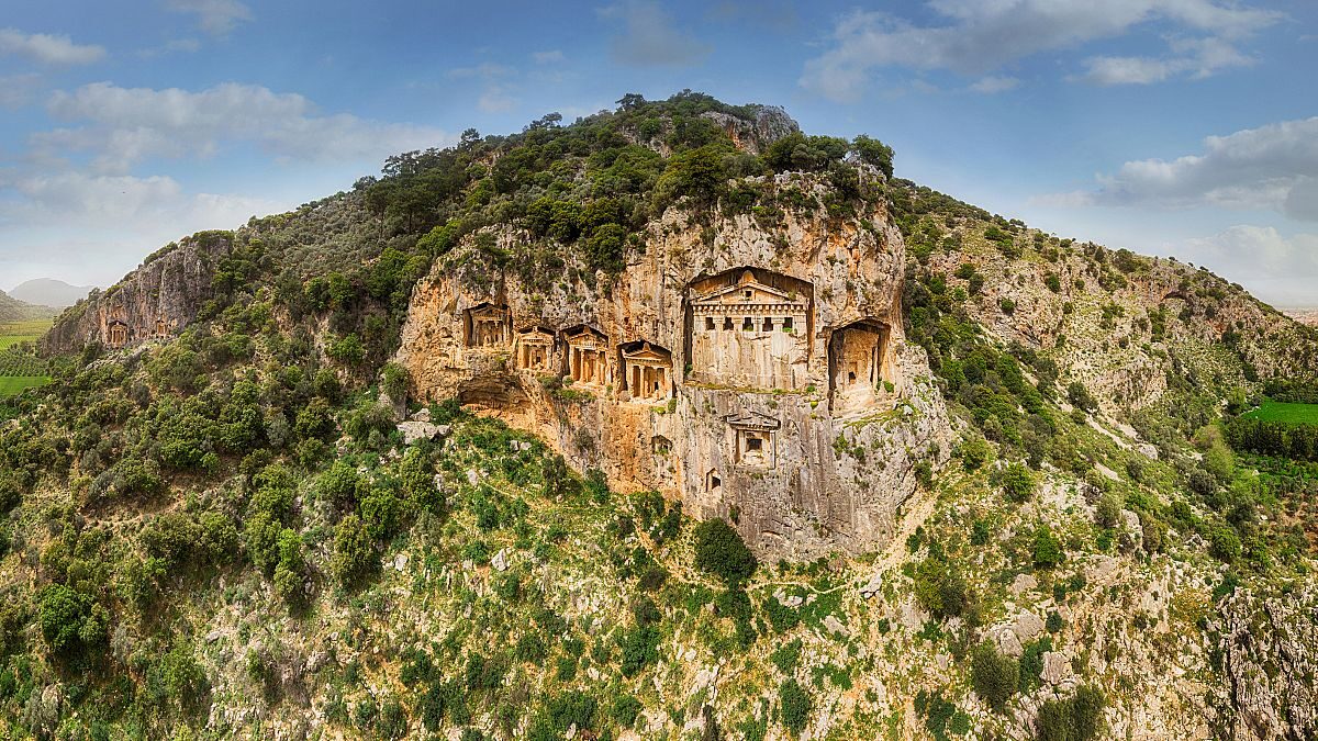 Ancient Lycian rock-cut King’s Tombs carved into the cliff above the Dalyan river