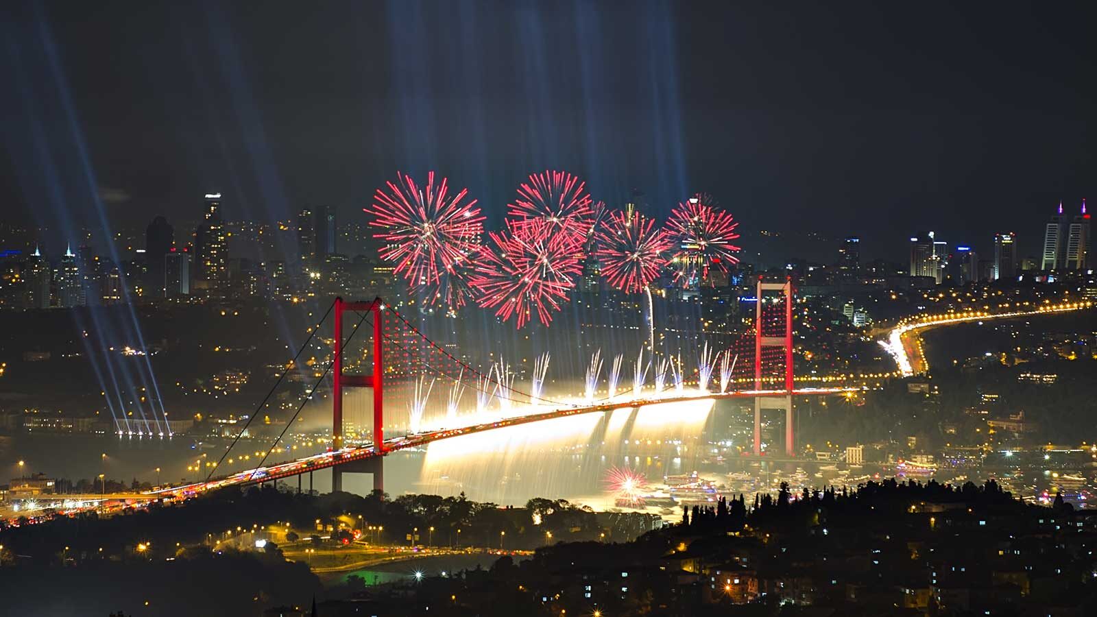Fireworks bursting over the Bosphorus Bridge in Istanbul on New Year’s Eve