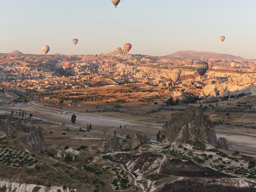 Cave dwellings and rock formations of Cappadocia at dawn
